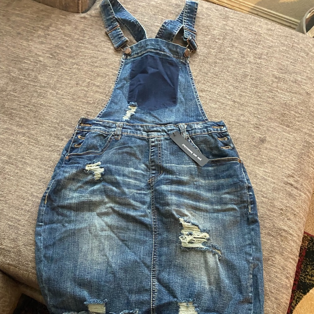 Denim jumper from Rue 21. Stretchy material. Size 14